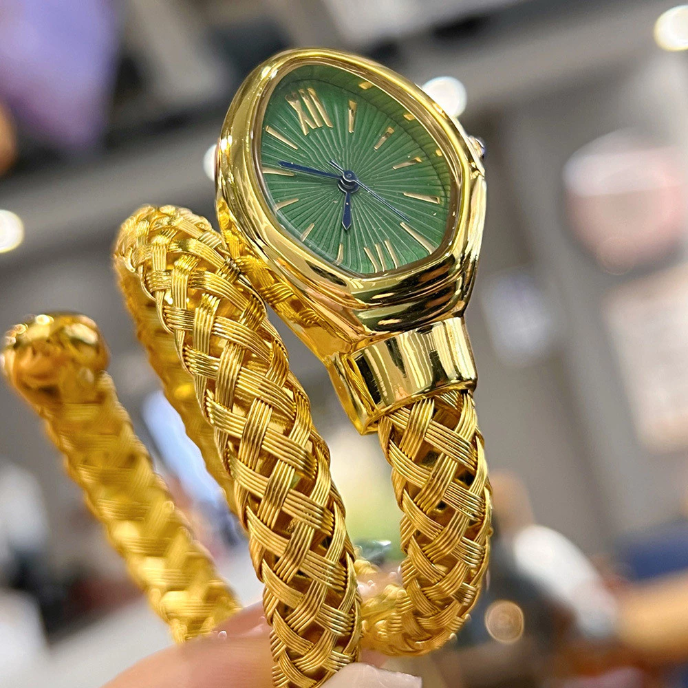golden serpentine snake women’s luxury watch – emerald green dial golden serpentine snake women’s luxury watch – emerald green dial