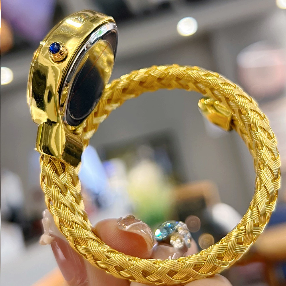 golden serpentine snake women’s luxury watch – emerald green dial golden serpentine snake women’s luxury watch – emerald green dial